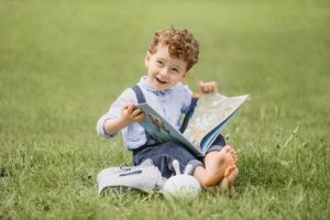 Person Child Book Sitting Grass  - lubovlisitsa / Pixabay